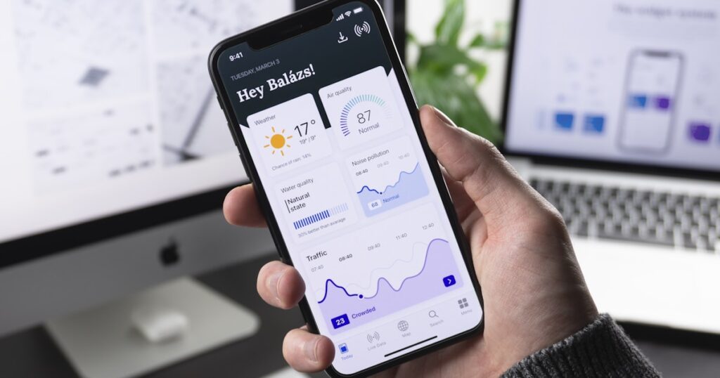 mobile app security practices - Mobile app development with smartphone showing application interface